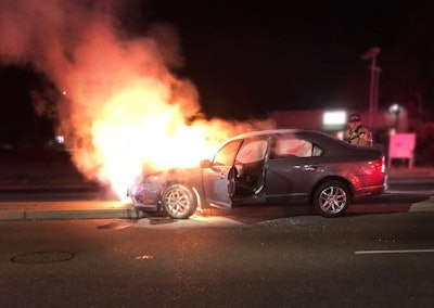 Officers with the Citrus Heights (CA) Police Department reportedly pulled an unconscious man from a burning car. Photo: Citrus Heights PD/Facebook