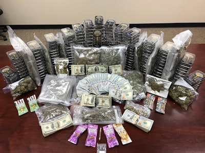 Deputies with the Fort Bend County (TX) Sheriff’s Office confiscated 6.5 pounds of marijuana, 198 THC vapes, Xanax and a more than $7,000 cash in a raid on Friday. Image courtesy of Fort Bend County (TX) Sheriff’s Office / Facebook.