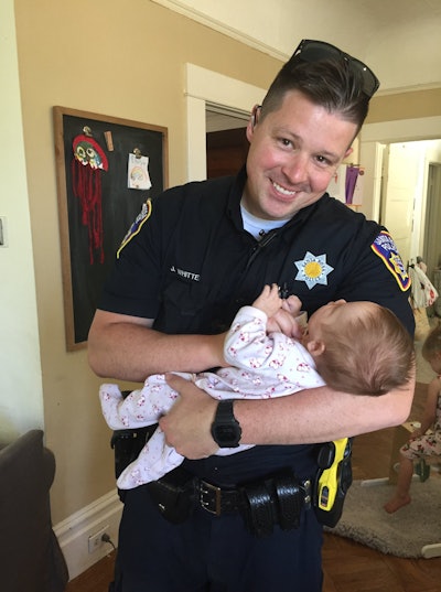 Officer Jesse Whitten had had occasionally encountered the woman while on patrol. During one encounter Whitten's wife was at his side. The two women struck up a conversation, and several months later learned that the homeless woman specifically requested that the Whittens adopt the baby girl. Image courtesy of Santa Rosa Police Department / Facebook.