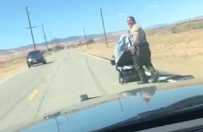 Deputy Montanez pushed an elderly woman's wheelchair all the way to her home a mile away. Photo: L.A. Sheriffs Lancaster Station/Facebook