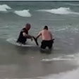 Two Australian police officers—Sergeants Christopher Russo and Kirby Tonkin—dove into the sea to save an unconscious kangaroo in danger of drowning.