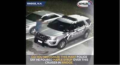 Screen grab of a video of a Rindge (NH) Police Department squad car being vandalized by a man who poured maple syrup all over the vehicle. Image courtesty of WMUR-TV.