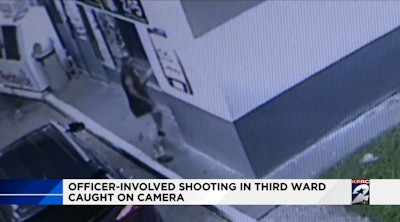 An officer with the Houston (TX) Police Department is either incredibly lucky, or incredibly good. Surveillance camera footage shows the officer shooting at an armed man at a gas station on Saturday night—the gun then flies from the suspect's hand.