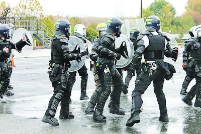 U.S. Park Police public order team officers train in all weather conditions, both night and day. (Photo: Geoff Perrin)