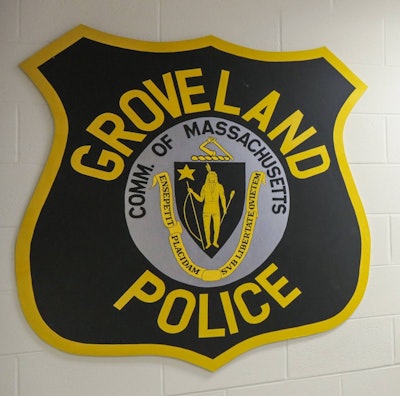 Officers with the Groveland (MA) Police Department had just rescued a 44-year-old hunter who had capsized a canoe on Parker River, when they found themselves in the same predicament. Image courtesy Groveland PD / Facebook.