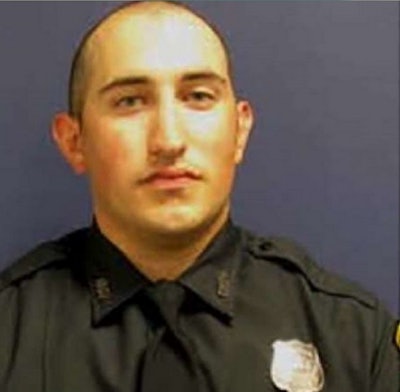 Officer John Daily was severely burned in a crash.