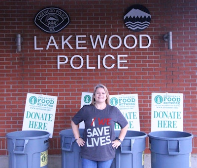 The agency said on Facebook on Friday, 'So far we've counted over $20,000 and over 12,000 pounds of food!' Image courtesy of Lakewood PD / Facebook.