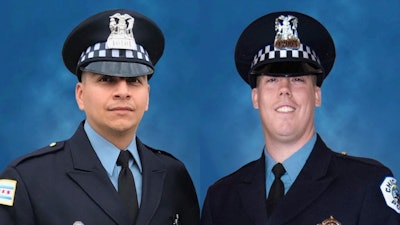 Chicago police officers Eduardo Marmolejo, 36, and Conrad Gary, 31, were killed when they were struck by a train while responding to a call of shots fired, officials said. (Photo: Chicago Police Department)