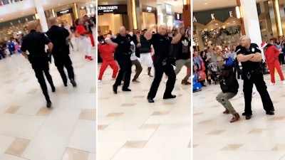 Aventura Florida police officers joined local dancers in a flash mob routine at the mall. (Photo: Aventura PD/Twitter)