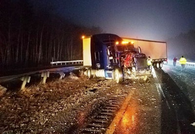 A Maine state trooper was injured early Friday morning when his patrol vehicle was hit by a tractor-trailer truck. (Photo: Maine State Police)