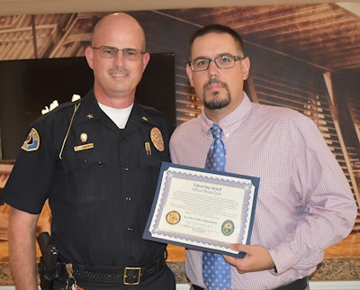 Key West Police Chief Sean Brandenburg, during an awards ceremony Friday at the Grand Key Resort, awarded Officer Bryan Tyler the department’s Life Saving Award.