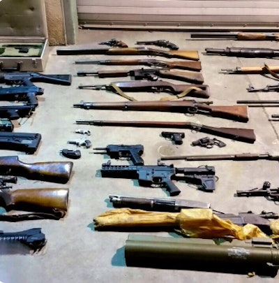 Los Angeles officers seized these weapons and explosives from a suspect's home. (Photo: LAPD/Twitter)