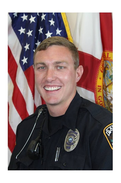 Officer Jonathan DePierre entered the five-foot-deep water and helped to hold the elderly female driver's head above water until he was able to free her from the sinking car.
