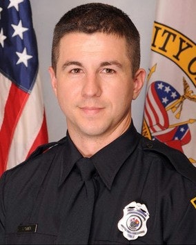 Officer Sean Tuder was shot and killed on Sunday afternoon as a group of officers attempted to arrest 19-year-old Marco Perez, who had reportedly faked his own kidnapping to avoid being taken to jail earlier in the week.