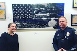 Student artist Alanna Rodriguez stands with School Resource Officer Mitch Brouillette of the Brentwood (CA) Police Department. Behind them is the painting she created and gave to the SRO with whom she has built a friendship.