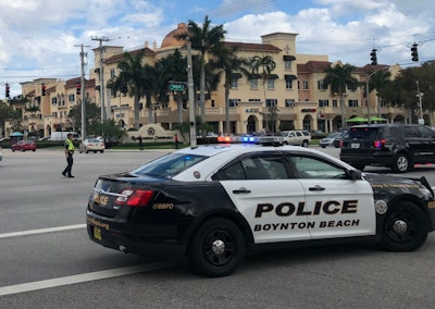 An officer with the Boynton Beach (FL) Police Department was struck by a vehicle as he was involved in a foot pursuit of a shoplifting suspect.
