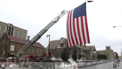 Flag honoring Milwaukee tactical officer killed Wednesday morning while serving a warrant. (Photo: WISN Screen Shot)