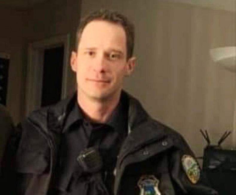 Officer Nicholas Galinger was with his field training officer inspecting a manhole cover that was overflowing with water when a passing Honda CRV struck him.