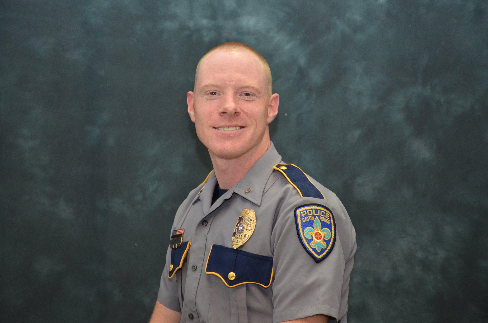 According to WBRZ-TV, 31-year-old Officer Shane Totty was escorting a funeral procession when a pick-up truck pulled in front of his motorcycle, striking him.
