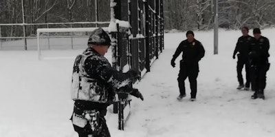 Officers with the Duvall (WA) Police Department took some time during Monday's inclement weather to have some fun with some young people at a local park.