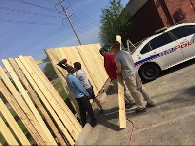 Officers with the Baton Rouge (LA) Police Department were joined by members of the community in an effort to rebuild the fence surrounding the fourth district precinct.