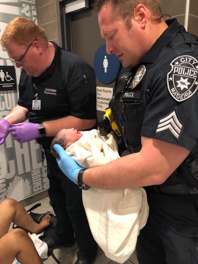 Officers with the Madera (CA) Police Department responded—alongside paramedics from Pistoresi Ambulance—to a woman who had begun childbirth at a local McDonald's restaurant last week.