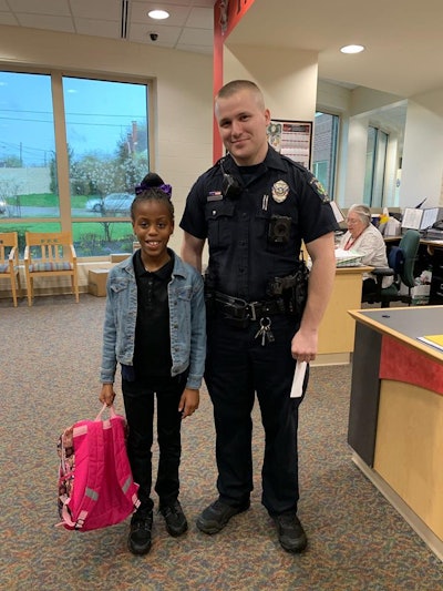 Officer Raymond Seehousen with the Mount Healthy (OH) Police Department escorted a little girl to school for the annual Father/Student day on Friday because the child's dad had recently been deployed for duty with the United States Army.