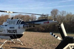 An Omaha Police helicopter made a rough landing after mechanical failure Tuesday. No one was injured. (Photo: KETV screen shot)