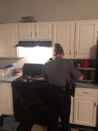 Sergeant Wendy Brewer and Officer Kegan Bostic kicked into action, searching the kitchen for something for the man to eat. Finding the cupboards bare but for a box of pancake mix, they set about the simple gesture of making a stack of pancakes for the man in need.