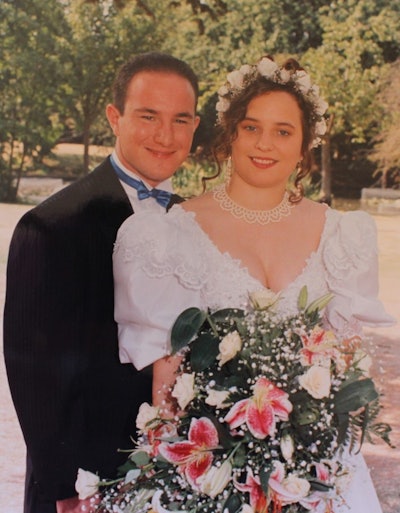 Kerry Avery, M.Ed. with her husband on their wedding day in 1995.