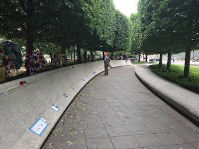 That's me, walking the wall early on my first day in DC for National Police Week. I was on the ground in DC for four days, and visited the Police Memorial Wall nine times. It's fascinating to see how it changes over time as new mementos are left by family and friends of officers who were killed in the line of duty over the years.