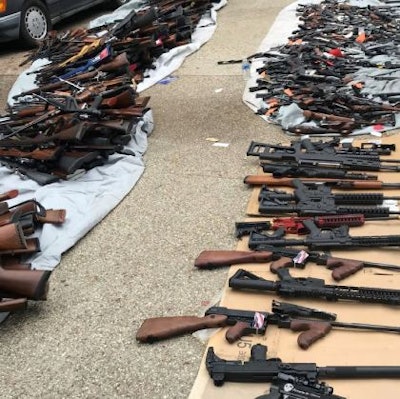 Officers seized more than 1,000 illegal firearms that were reportedly being sold to gang members.