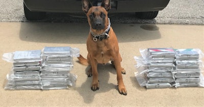 K-9 'Spyke' with the Fort Bend County Narcotics Task Force—a multi-agency initiative of the Houston HIDTA—is being credited with sniffing out a $1.4 million cocaine shipment secreted in a custom compartment in a vehicle on a local highway last week.