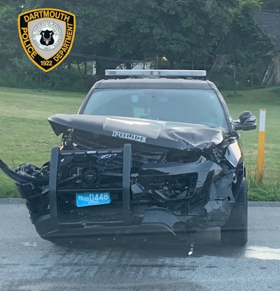 An officer with the Dartmouth (MA) Police Department was injured on Sunday when his patrol vehicle was struck by a suspected drunk driver.