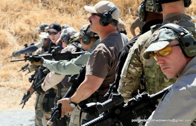 Because you have accepted me into your family, I've had the great fortune of receiving some of the best law enforcement training available. Here, I—far right in the frame—participate in excellent long gun training with Bay Area cops back in 2013.