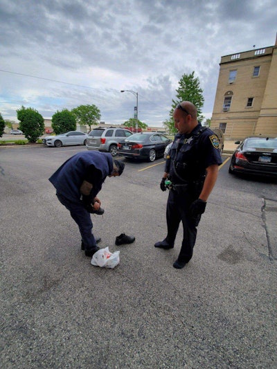 An officer with the Niles (IL) Police Department gave a homeless man the shoes off his own feet over the weekend.