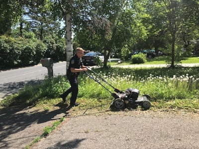 An officer with the Orono (MN) Police Department was called to do a welfare check on an elderly woman's home late last week, and having completed that objective decided to also attend to her overgrown lawn.