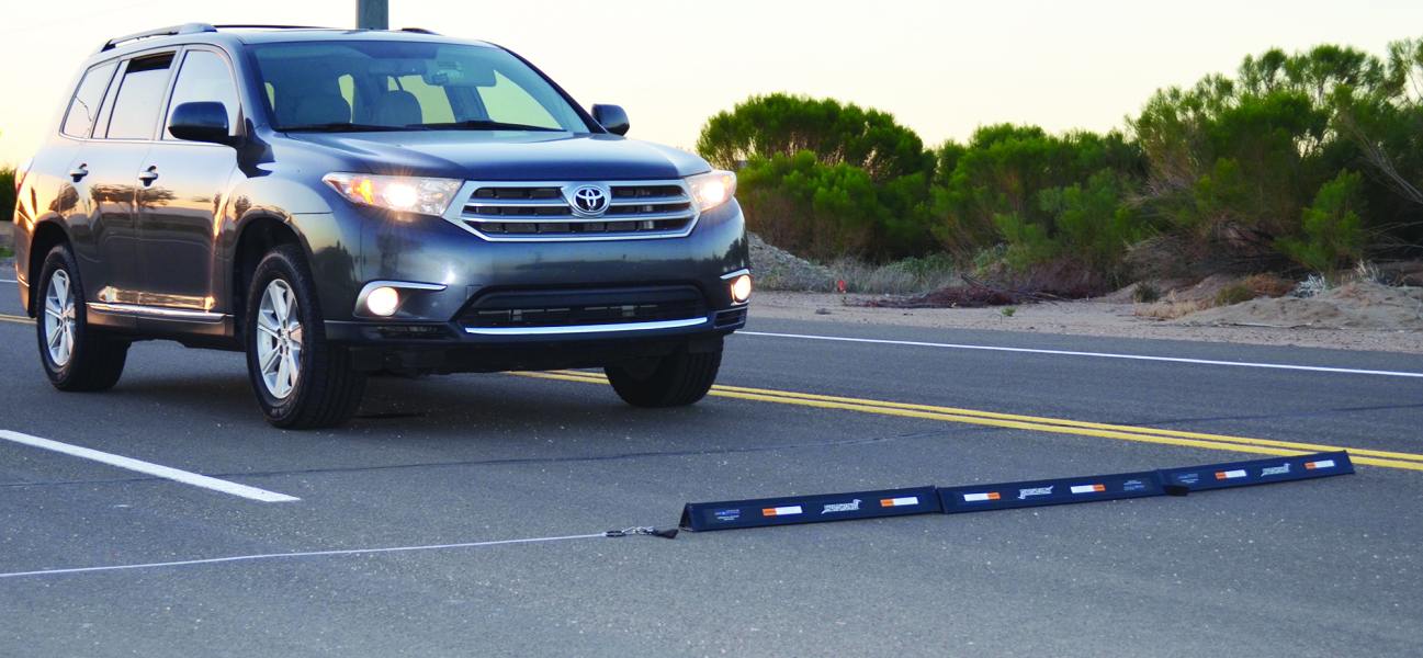 End-X Phantom Spikes PT-700 spike strip features a line and reel system with a 2-to-1 ratio for quick retrieval.