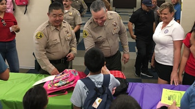 Deputies with the Los Angeles County Sheriff's Department over the weekend held an event to provide school supplies to underprivileged children in the region.