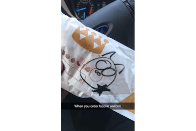 An officer with the Clovis (NM) Police Department took his shift meal break at a local Burger King restaurant and was disappointed to discover that on the wrapper of his order was a drawing of a pig.