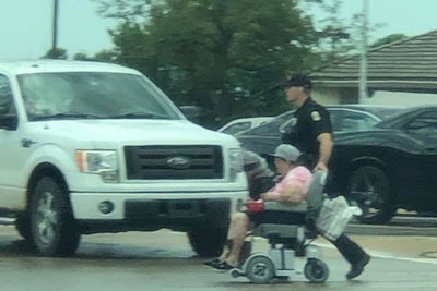 An officer with the Wichita Police Department was seen helping a woman in a wheelchair across a busy intersection over the weekend. Photos of the act of kindness posted to social media quickly went viral.