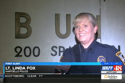 Lt. Linda Fox was given the medal of valor for saving a woman from deadly floodwaters.