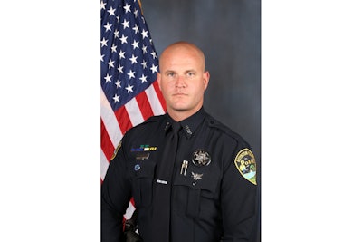 Officer Chris Schalk rushed to a woman's aid after her family started shouting that she wasn't breathing.