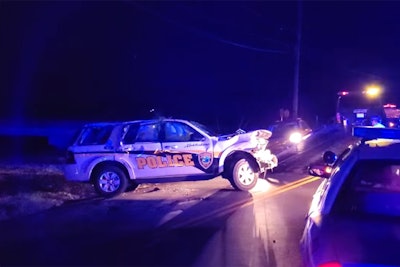 A lieutenant with the Middlesboro (KY) Police Department was involved in a rollover accident when he swerved to avoid striking a bicyclist who suddenly darted out in front of him while engaged in a vehicle pursuit on Tuesday.