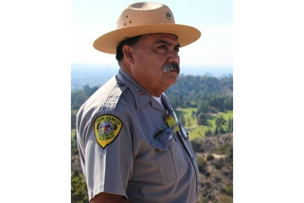 Captain Albert Torres with the Los Angeles Department of Recreation and Parks suffered a fatal heart attack after a 14-hour shift of patrolling parks and remote areas in the evacuation zone where wildfire had just destroyed more than 20 homes and prompted mandatory evacuations of 100,000 residents.