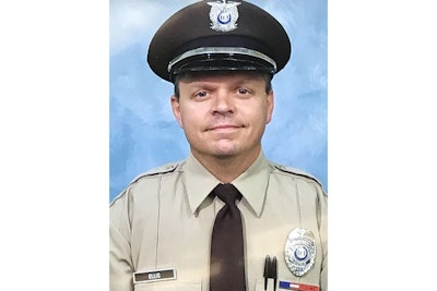 Officer James 'Mitch' Ellis, 49, died in a head-on collision on his way home from work.
