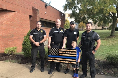 James Shelton recently made by hand a wooden representation of the Thin Blue Line Flag and dropped it off at the Montgomery County (MD) Police Department as a gift on National First Responders Day.