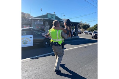 An officer with the California Highway Patrol came to the aid of a runner who suffered a stress fracture in her leg during a marathon / half-marathon event over the weekend in the forested area of Big Bear in the mountains just east of Los Angeles.