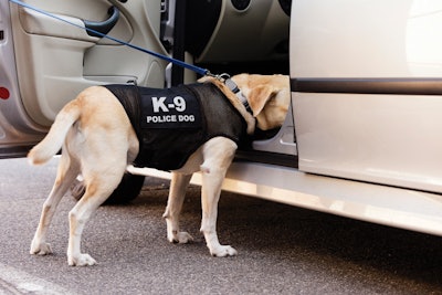 At 12 minutes into the stop, the dog alerted to drugs in the car and the officers seized a half pound of heroin.