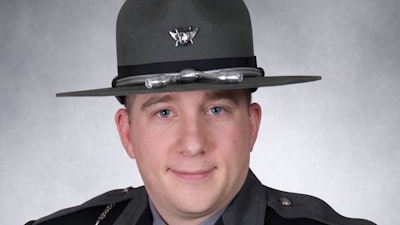 Trooper Jason R. Hofmann of the Ohio State Highway Patrol was airlifted to a hospital after being hit by a van. (Photo: OSHP)